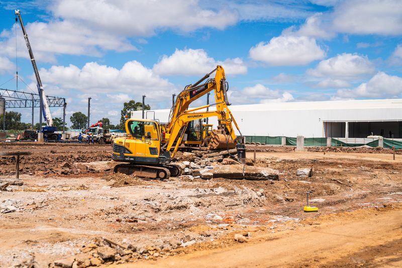 Excavator on demolition works