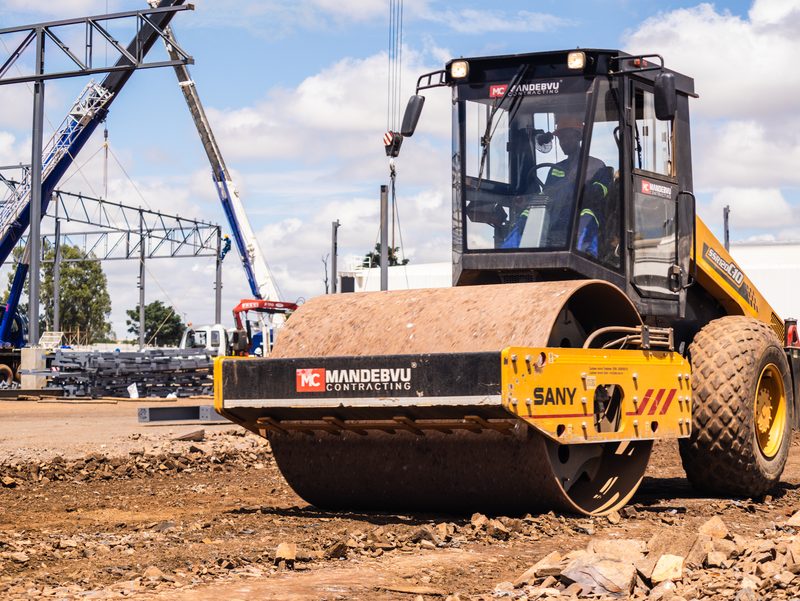 Roller compacting the platform
