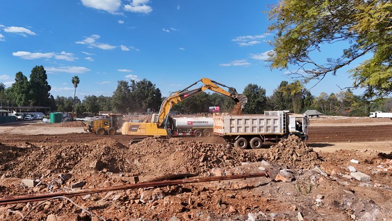 Excavator loading a tipper