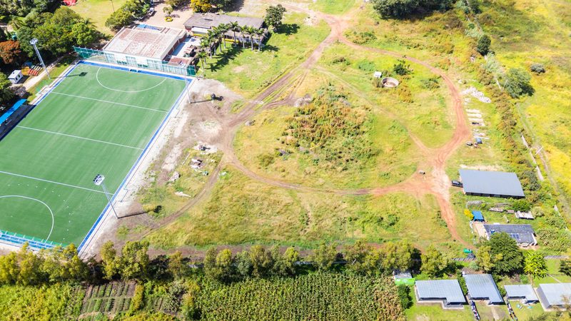 Track site before construction, beside the astro